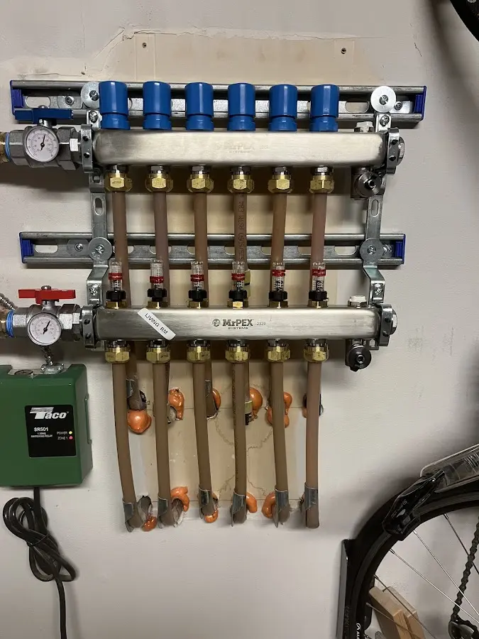 Plumber performing Water Heater Repair at a residential property in West Loch Estate